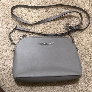 Michael kors sling purse authentic